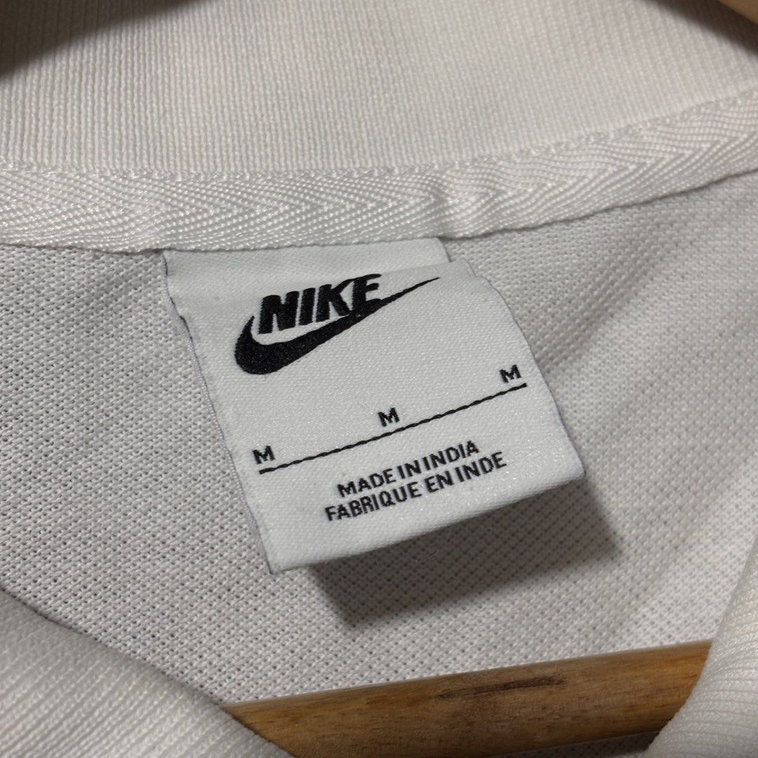 Nike Polo Shirt White Size M (Category: Tshirts & Polo Shirts ) located in Caloocan City. Submitted by bonsatocha43876 (Listing ID 1461978155, Image 3). Description: - Brand: Nike - Type: Polo Shirt - Color: White - Size: Medium (M) - Material: 100% Cotton - Origin: Made in India - Measurements: 20 inches (width) x 29 inches (length) - Ideal for: Casual wear, sports activities - Features: Classic Nike design.