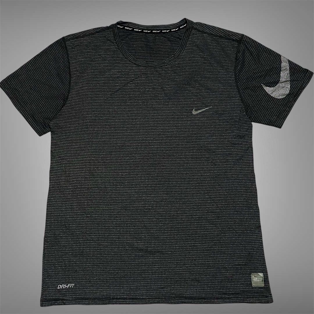 Nike Pro Combat (Category: Activewear) located in Mabalacat. Submitted by stellargarments (Listing ID 1461808462, Image 1). Description: L - 27 W - 21 Condition : 9/10 Drifit Fabric Buong buo lahat ng logos Smooth on skin fabric Medjo lukot lang kasi fresh from bale Need wash fresh from bale.