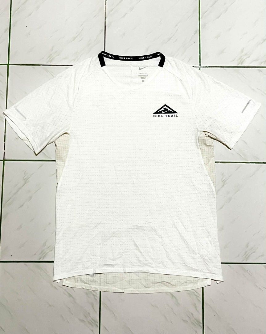 Nike Trail Drifit Men's Tshirt (Category: Tshirts & Polo Shirts ) located in Binalbagan. Submitted by dcorexyzzz (Listing ID 1461828231, Image 1). Description: Medium 18/27 Excellent condition No issues Need wash only - Dri-FIT material for superior breathability - Features the iconic Nike Trail logo on the chest - Reflective details on the sleeves for enhanced visibility - Ideal for running, hiking, and other outdoor activities.