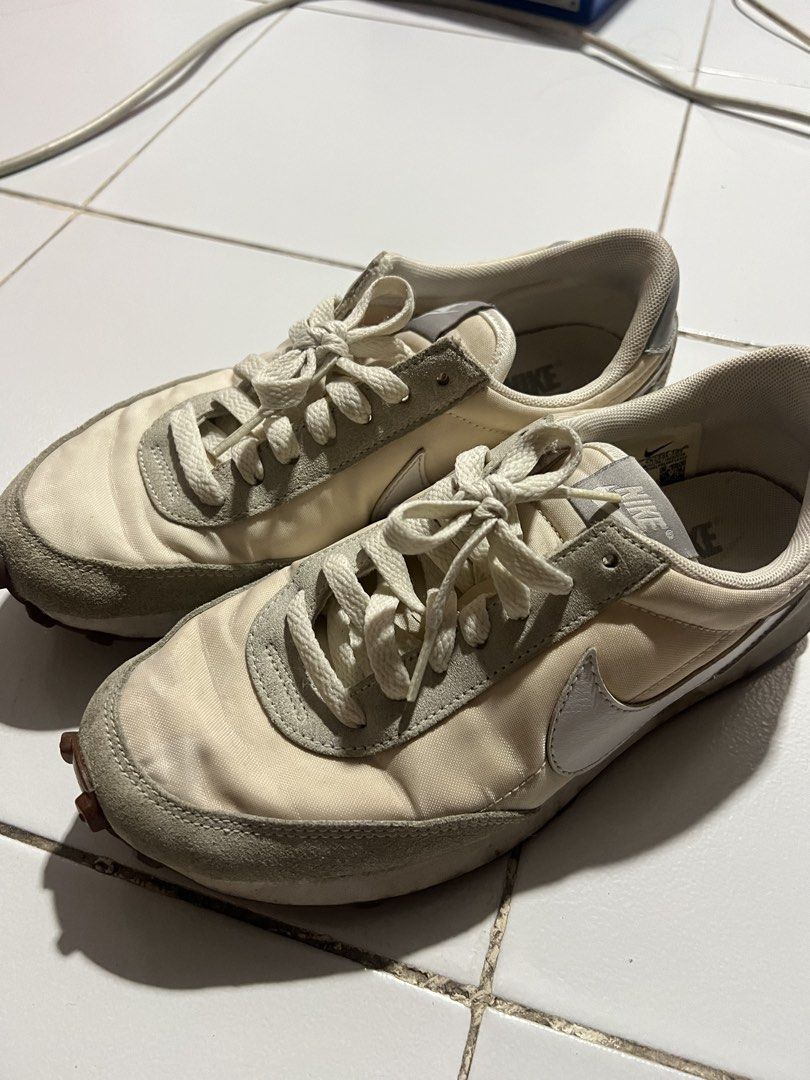 Nike Waffle Trainer 2 SE CK2351-101 (Category: Sneakers) located in Quezon City. Submitted by vieee_ (Listing ID 1461988176, Image 1). Description: - Nike Waffle Trainer 2 SE - Color: Cream & Grey - Size: US 6.5 (UK 4, EUR 37.5) - Made in: Indonesia - Condition: Used, with signs of wear on soles and fabric. Plenty of life left. - Please check photos for detailed condition. - Negotiable.