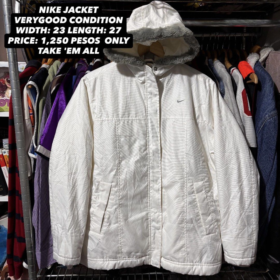Nike White Hooded Jacket with Fur Trim (Category: Coats, Jackets and Outerwear) located in Caloocan City. Submitted by bonsatocha43876 (Listing ID 1461985144, Image 1). Description: - White Nike jacket with hood - Faux fur trim on hood - Quilted lining for extra warmth - Made in the Philippines - Features a YKK zipper - Ideal for cooler weather - Price: PHP 1,250.
