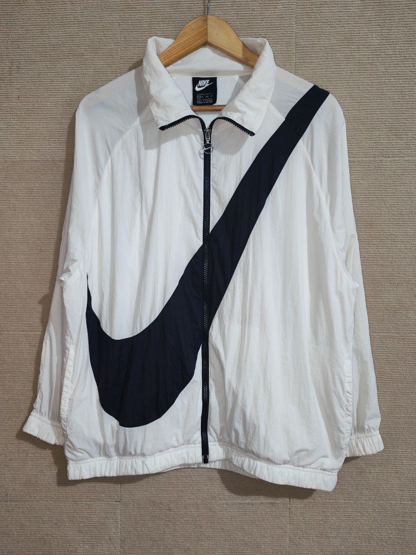 Nike Windbreaker Big Swoosh Nylon (Category: Coats, Jackets and Outerwear) located in Iligan City. Submitted by wantwears14 (Listing ID 1461869051, Image 1). Description: Guaranteed Authenticity 9.5/10 Color rate Needs wash Flawless XS on tag Can fit to Large Body Frame.
