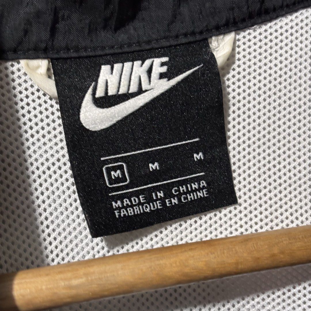 Nike Windbreaker Jacket Black White Size M (Category: Coats, Jackets and Outerwear) located in Caloocan City. Submitted by bonsatocha43876 (Listing ID 1461984533, Image 2). Description: - Nike Windbreaker Jacket - Color: Black & White - Size: Medium (M) - Material: 100% Nylon/Mesh body, Recycled polyester panels - Condition: Very Good (complete tags) - Measurements: Width 24", Length 23" - Price: ₱750.