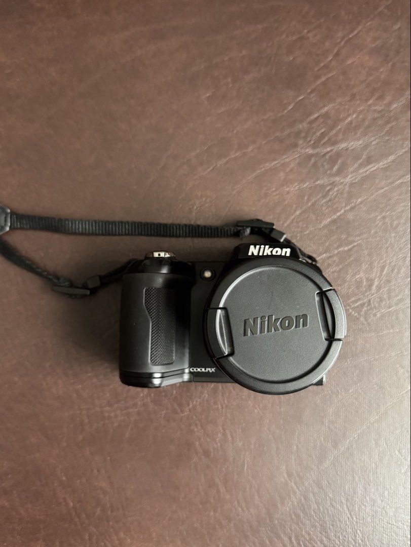 Nikon Digital Camera (Category: Cameras) located in Quezon City. Submitted by fndlst (Listing ID 1461825676, Image 1). Description: Nikon COOLPIX L110 digital camera - Comes with strap and 4GB memory card - Lens cap included - Perfect for everyday photography - User-friendly and easy to operate - In good working condition Features: 12.1 MP digital camera 15x optical zoom HD video recording 3-inch LCD display Easy-to-use controls Compact and conve