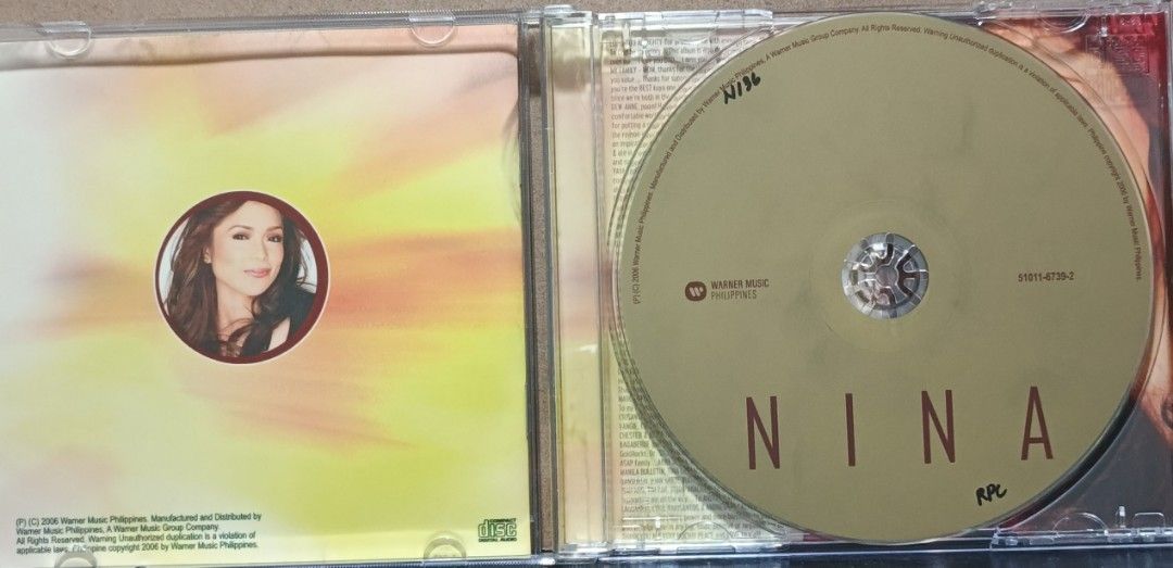 Nina - Nina CD (2006) (Category: CDs & DVDs) located in Manila. Submitted by ruelcabrer77078 (Listing ID 1461968394, Image 2). Description: Nina's self-titled album from 2006. Features tracks like 'I Do', 'Ooh Boy', and 'Love is Contagious'. Includes a bonus track 'Araw mo'. Manufactured and distributed by Warner Music Philippines. Great for fans of Nina..