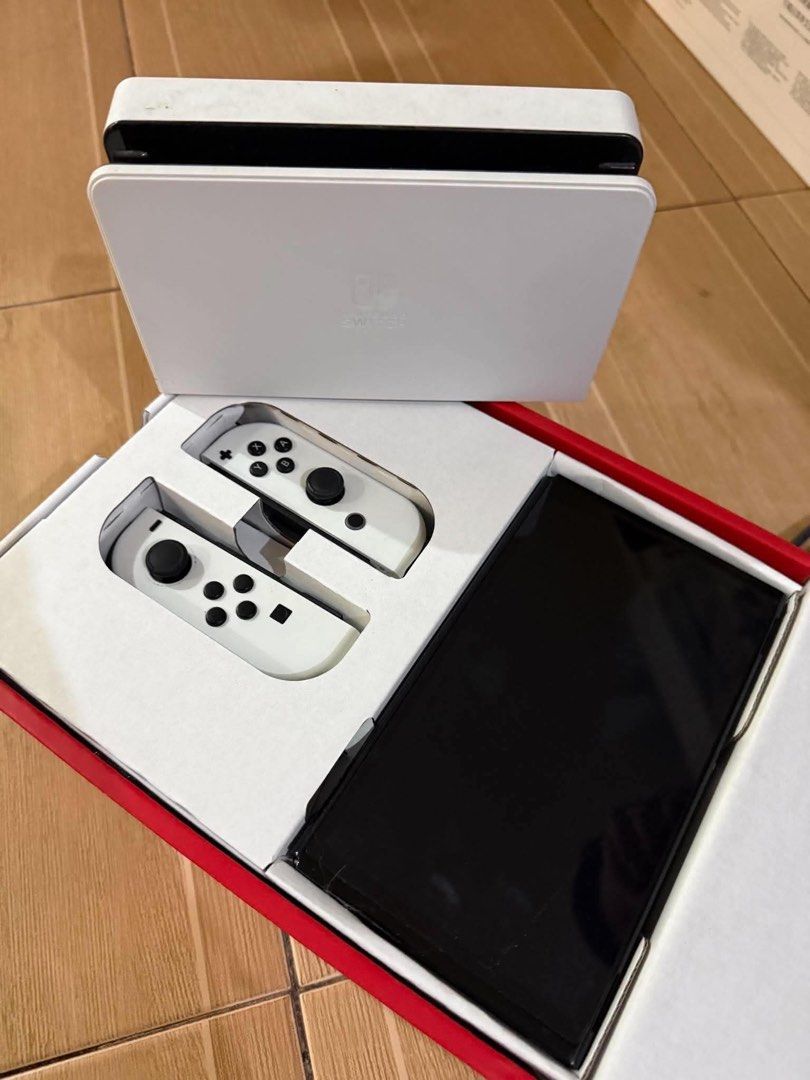 NINTENDO OLED MODEL (Category: Nintendo) located in Manila. Submitted by angelrebuy57634 (Listing ID 1461911321, Image 3). Description: ALL IN THE PICTURE INCLUDED WITH 3 games .