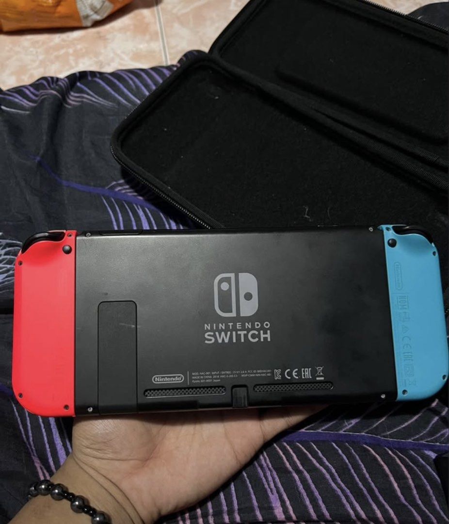 Nintendo Switch Console with Blue and Red Joy-Cons (Category: Nintendo) located in Valenzuela. Submitted by zyruz_navs (Listing ID 1461939442, Image 2). Description: - Nintendo Switch Console - Blue and Red Joy-Cons included - blue Carrying Case - Good working condition - Ready for new games -complete package - Feel free to ask questions! .