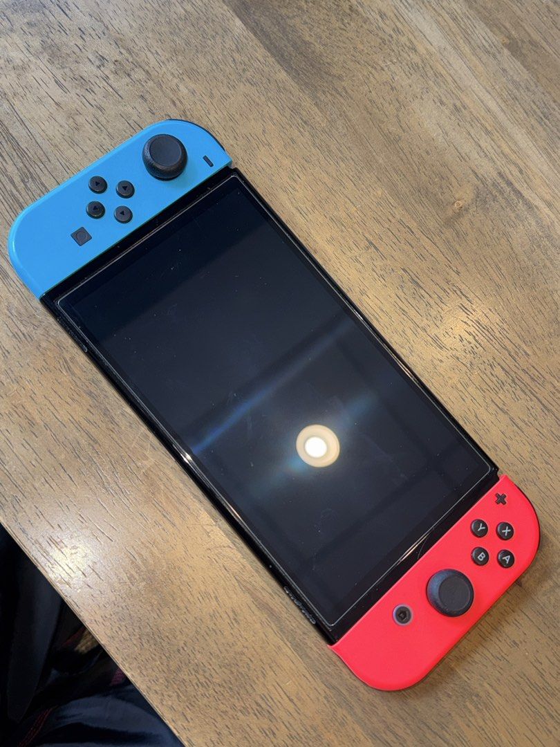 Nintendo Switch Console with Blue and Red Joy-Cons (Category: Nintendo) located in Bacoor. Submitted by mckoym (Listing ID 1461982780, Image 1). Description: - Nintendo Switch Console - Includes Blue and Red Joy-Cons - Clean Screen - Great for home or on-the-go gaming - Ready for new adventures!.