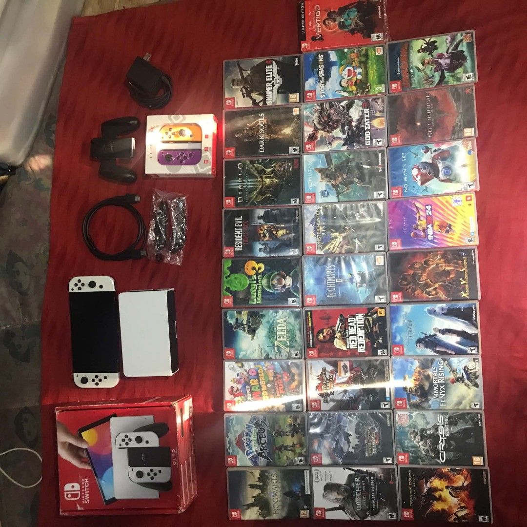 Nintendo Switch OLED Console with Games and Accessories (Category: Nintendo) located in Manila. Submitted by royalstar.8b3052 (Listing ID 1461949861, Image 3). Description: Nintendo Switch OLED complete - 38k negotiable Issue: minimal scratches and pudpod rubber ng analog, R of original joycon no response. (may replacement joycons na left and right ✅) Included: Nintendo Switch OLED complete with box (no inner) 128 GB SD card ONN Extra pair of Joy