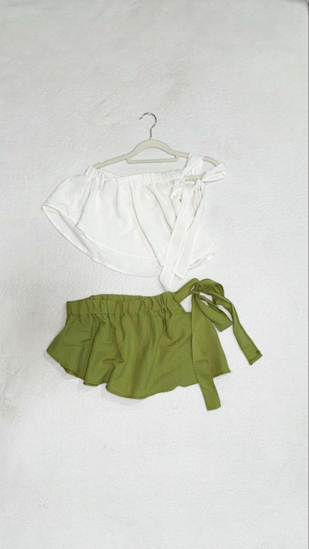 NKD Clothing Tie Top (Category: Sleeveless) located in Manila. Submitted by mmilaomls (Listing ID 1461910051, Image 1). Description: - Cute off-shoulder top with tie details - Ideal for casual days or beach trips - Both pieces are lightweight and comfortable - Get both for only 110.