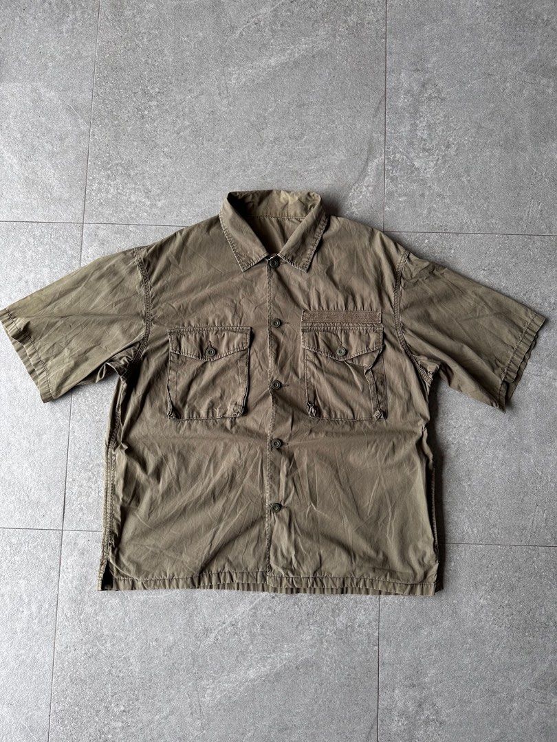 Olive Green Short Sleeve Utility Shirt (Category: Tshirts & Polo Shirts ) located in Angeles City. Submitted by ordinario_damit (Listing ID 1461985138, Image 1). Description: - Olive green short sleeve shirt - Two chest pockets with button closures - Button-up front - Utility/workwear style - Great for casual wear DIMES: 23 WIDTH 28 LENGTH.