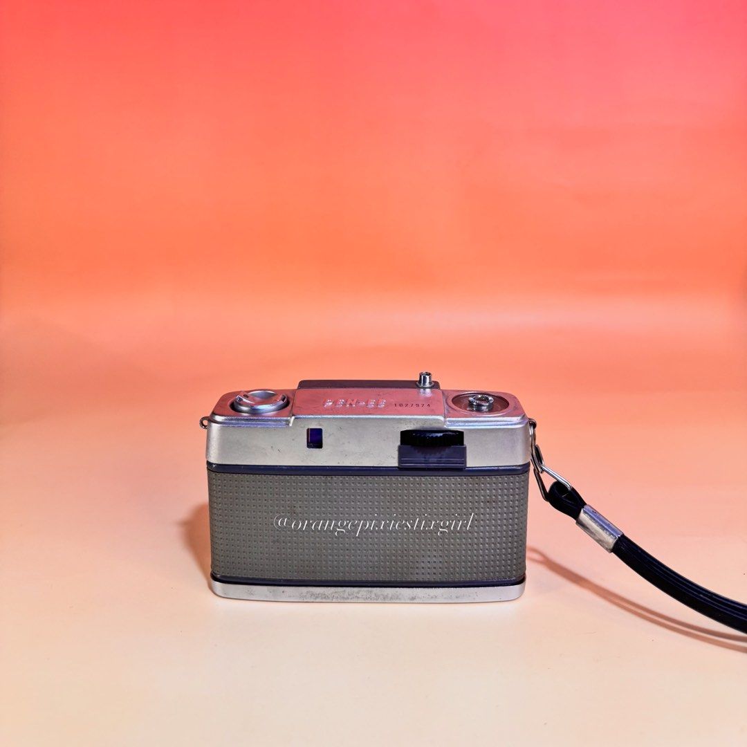 Olympus Pen EE Half Frame Film Camera (Category: Cameras) located in Bulacan. Submitted by orangepixiestixgirl (Listing ID 1461859595, Image 2). Description: ‼️message me on ig, @orangepixiestixgirl for inquiries and transactions‼️ ‼️CAN’T REPLY HERE‼️ Olympus Pen EE Half Frame Film Camera —Red flag light meter indicator is working, it appears in low-light conditions as intended. —Lens: Fixed D.Zuiko 28mm f/3.5 —The “EE” stands for “Electric Eye,