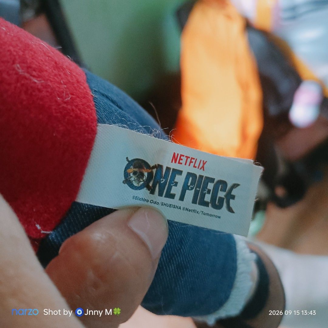 One Piece Netflix Monkey D. Luffy Plush Toy (Category: Plushies & Soft Toys) located in Taguig. Submitted by mhayestufftoys (Listing ID 1461845648, Image 2). Description: - Soft and huggable Monkey D. Luffy plush toy - Inspired by the Netflix One Piece series - Ideal for fans of the show - Great for display or playtime.