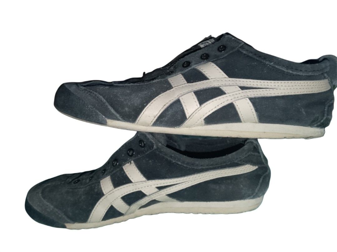Onitsuka Tiger Slip-on (Category: Sneakers & Footwear) located in Manila. Submitted by gab_thrift17 (Listing ID 1461806329, Image 1). Description: - Brand: Onitsuka Tiger - Model: Slip-on - Color: Dark with beige stripes - Size: US 4.5 / 23cm / EU 37 - Features: Classic Onitsuka Tiger stripes, slip-on design for easy wear - Condition: Used, with visible signs of wear as shown in photos.