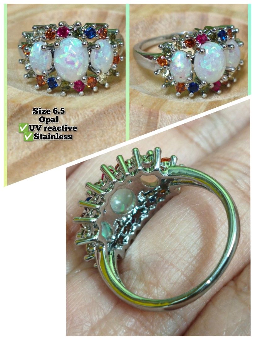Opal Stainless Steel Ring Size 6.5 UV Reactive (Category: Rings) located in Quezon City. Submitted by gemaicloset (Listing ID 1461947410, Image 1). Description: - Size 6.5 ring - Features UV reactive oval opals - Surrounded by vibrant accent stones: blue, orange, and pink - Made of durable stainless steel - Adds a unique pop of color to any outfit.
