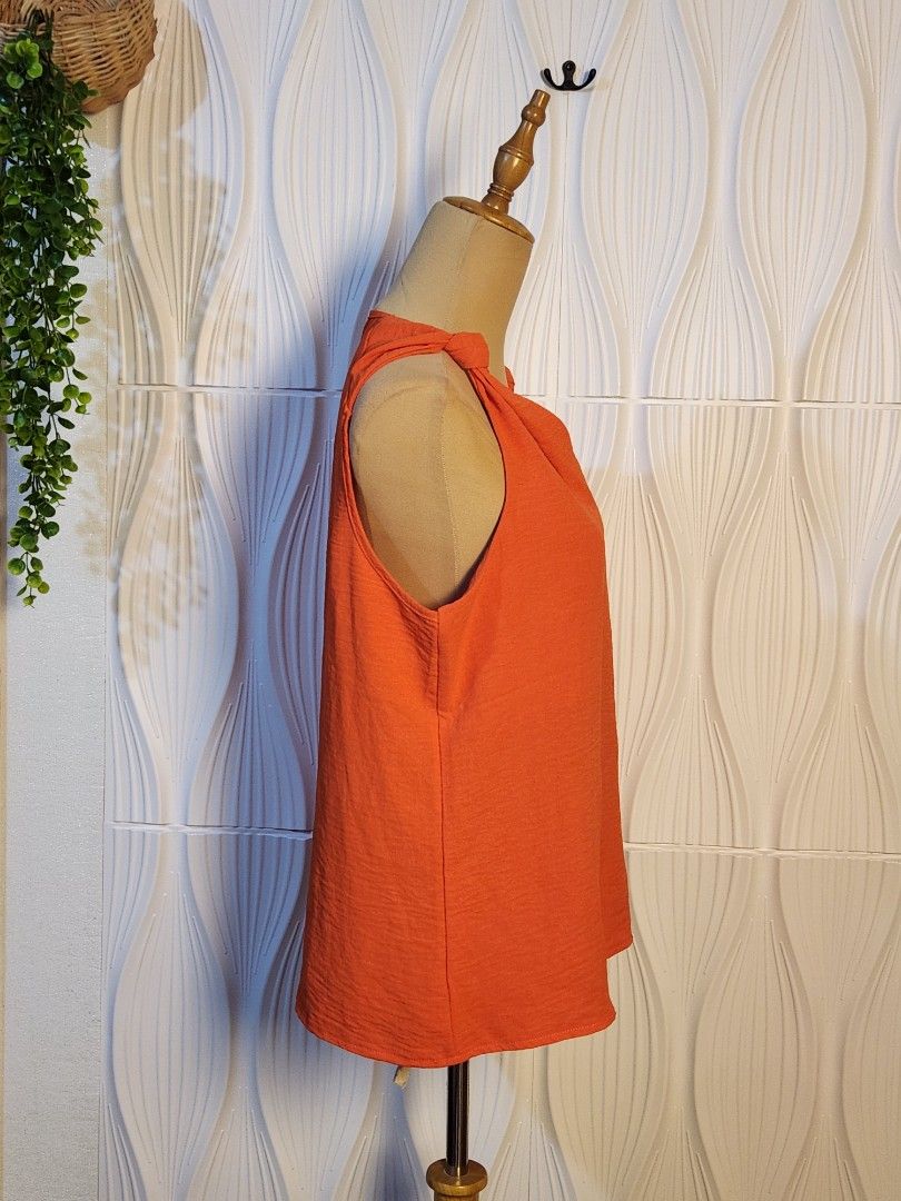 Orange sleeveless XL (Category: Sleeveless) located in Marikina City. Submitted by KanamiFinds (Listing ID 1461817514, Image 2). Description: Bust: 44 to 46 inches Length: 24 to 25 inches.