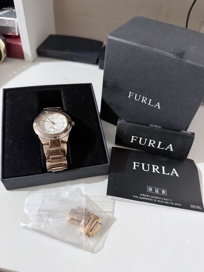 Original Furla Rosegold Multifunction Quartz watch (Category: Luxury Watches) located in Paranaque City. Submitted by debonair02 (Listing ID 1461836975, Image 1). Description: Bought it from Japan Original Furla Rosegold Multifunction Quartz watch Condition Color rate: ✅9/10 dial, case ✅8/10 Bracelet strap (minimal fading as seen in the photo due to wearing) ✅in good condition ✅Working watch ✅With box and manuals and extra links PM SURE BUYER ONL