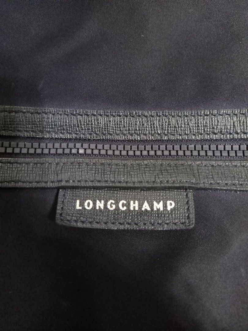 Original longchamp backpack (Category: Backpacks) located in Binmaley. Submitted by fashionluxury058 (Listing ID 1461814551, Image 2). Description: original longchamp backpack in good condition size: medium unisex color blue.