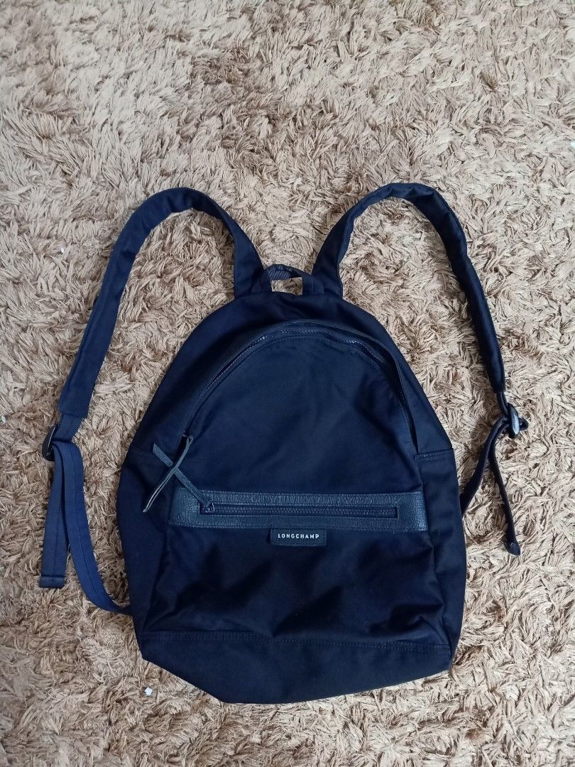 Original longchamp backpack (Category: Backpacks) located in Binmaley. Submitted by fashionluxury058 (Listing ID 1461814551, Image 1). Description: original longchamp backpack in good condition size: medium unisex color blue.
