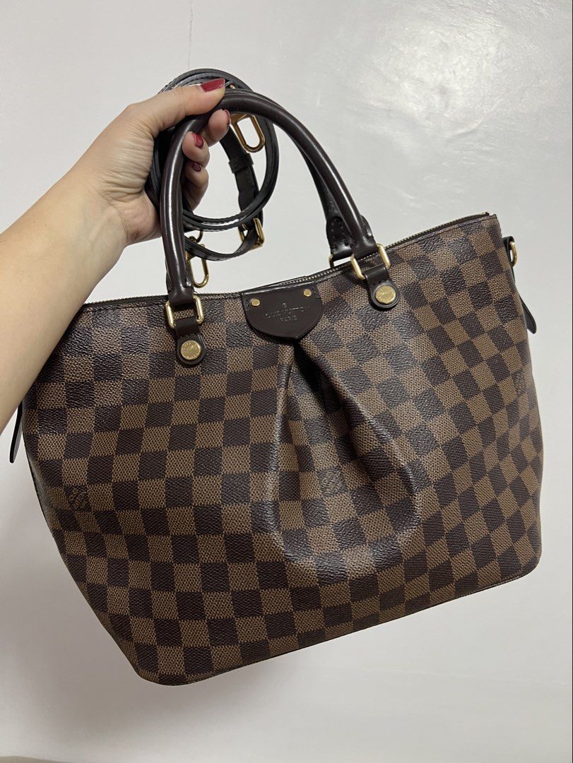 Original Louis Vuitton Sienna Damier Bag (Category: Luxury Bags & Wallets) located in Cavite. Submitted by authenticbagshavenbyvalg (Listing ID 1461801930, Image 1). Description: Guaranteed Original 💯 very good condition no major issue MM Size with dustbag.