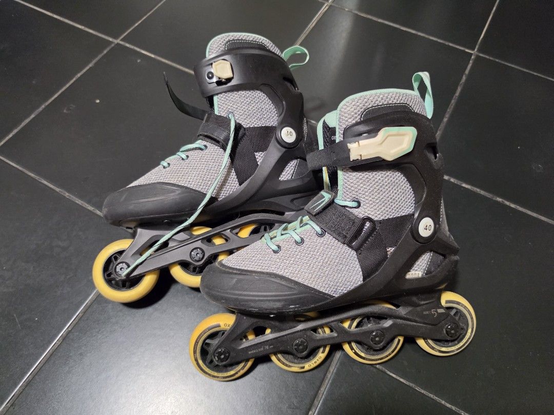 Oxelo Rollerblades (Category: Skates, Rollerblades & Scooters) located in Pasig City. Submitted by dmtp7 (Listing ID 1461893206, Image 1). Description: - Oxelo inline skates - Color: Grey and mint green - Size: 40 EU - Closure: Laces and velcro straps for a secure fit - Condition: Good, with minor scuffs from normal use - Comes with protection: knee pads and elbow pads - Perfect for skating around and your next skate session RFS: decluttering MOP