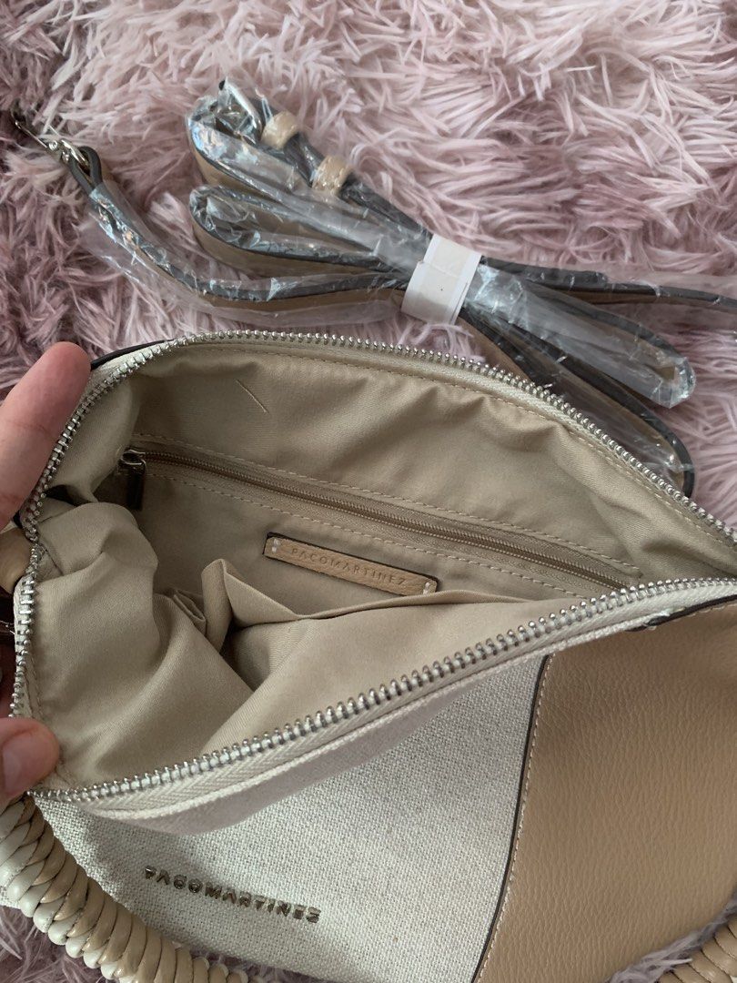 Pack Martinez Beige Canvas Leather Handbag with Braided Handle (Category: Shoulder Bags) located in Manila. Submitted by _xsleey (Listing ID 1461914181, Image 3). Description: - Paco Martinez handbag - Beige and tan color block design - Canvas front panel with leather sides - Unique braided handle - Detachable shoulder strap included - Zipper closure - Interior zip pocket and slip pockets - Ideal for everyday use.