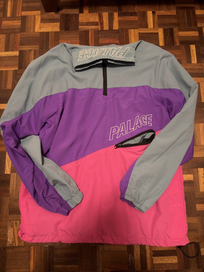 Palace Colourblock Anorak Jacket (Category: Coats, Jackets and Outerwear) located in Manila. Submitted by caballeroa11402 (Listing ID 1461973093, Image 1). Description: - Cool Palace anorak jacket - Colourblock design: light blue, purple, and pink panels - Half-zip closure - Front pouch pocket with zip - Palace logo on chest and collar - Ideal for casual wear.