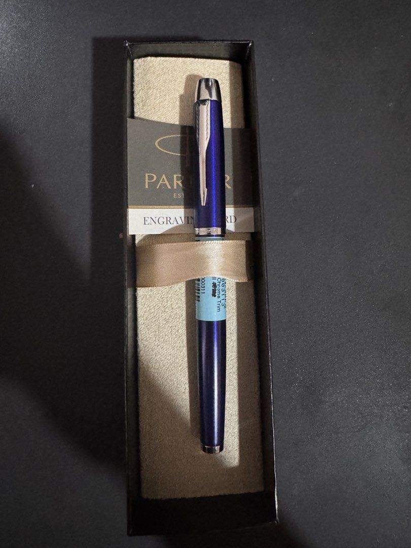 Parker IM Blue Chrome Trim Rollerball Pen (Category: Stationery & School Supplies) located in Taguig. Submitted by noblemountain_168dd6 (Listing ID 1461896734, Image 1). Description: Parker IM Blue Chrome Trim Rollerball Pen - Pen Color: Deep Blue - Included Ink: Black Gel - Condition: Barely used - Packaging: Comes in original Parker box with free engraving - Current SRP: ₱2800 - Selling it only for ₱2200 Price is negotiable .