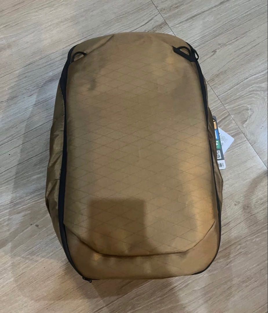 Peak Design Travel Backpack 30L (Category: Backpacks) located in Taguig. Submitted by georgie_porgiepotpot (Listing ID 1461835018, Image 1). Description: - Peak Design Travel Backpack - 30L capacity - Coyote exterior with black accents - Multiple compartments - Top handle and adjustable straps - Lightly used, still have original tags Lightly used. RFS: Tried to EDC but was too big for my taste. Meet ups in Taguig or Bicutan area. Shipping c/o buy