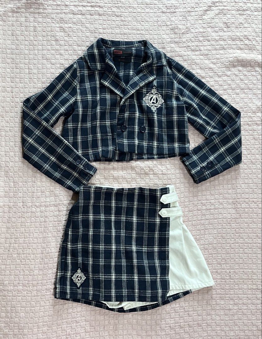 Penshoppe Marvel Plaid Coordinates (Category: Coats, Jackets and Outerwear) located in Mandaluyong City. Submitted by hopeworldplane (Listing ID 1461162772, Image 1). Description: - Navy and white plaid cropped jacket - Features embroidered Marvel logo on chest - Button-up front with collar - Long sleeves - School uniform inspired style.