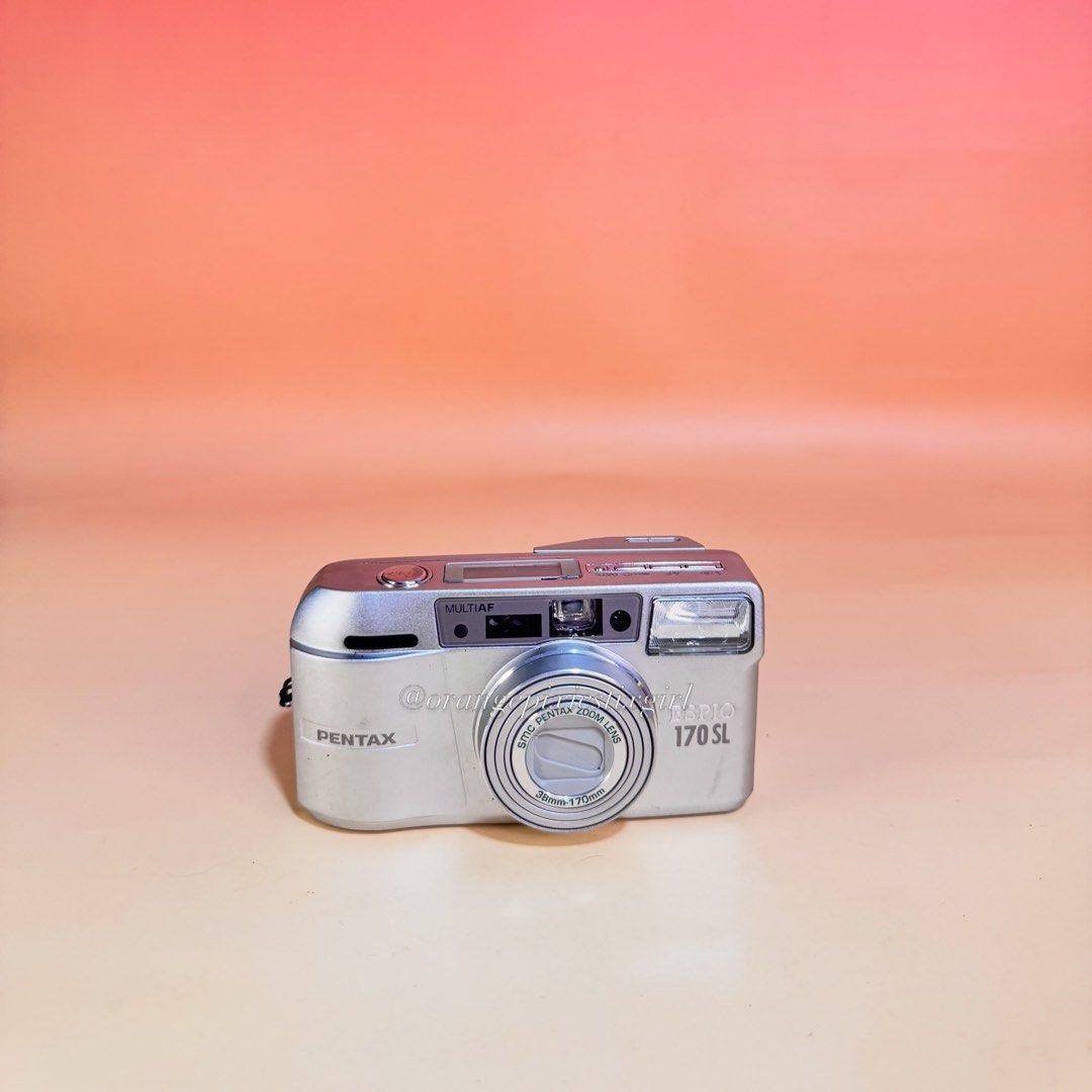Pentax Espio 170SL 35mm Film Camera (Category: Cameras) located in Bulacan. Submitted by orangepixiestixgirl (Listing ID 1461859413, Image 1). Description: ‼️message me on ig, @orangepixiestixgirl for inquiries and transactions‼️ ‼️CAN’T REPLY HERE‼️ Pentax Espio 170SL 35mm Film Camera —35mm film camera with automatic film advance and rewind. —SMC Pentax zoom lens with a 38mm–170mm focal range. —Multi-autofocus (Multi AF) system for capturing sha