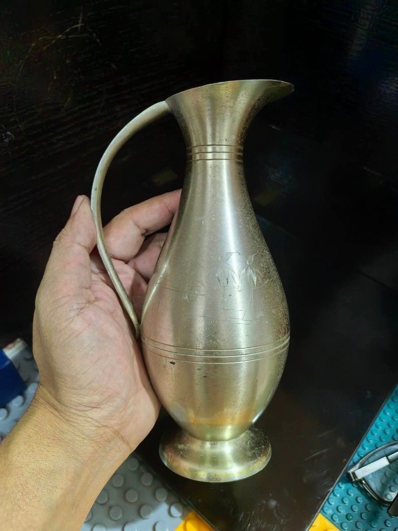 Pewter Pitcher or Vase (Category: Vases & Decorative Bowls) located in Cebu City. Submitted by dudes_villanueva (Listing ID 1461894453, Image 2). Description: Pewter Pitcher or Vase Markings : Pewter Penang Malaysia 📌 Featuring an engraved tropical scene with palm trees. 📌 Has few light scratches and tarnish on some parts. Height : 7.75 in.