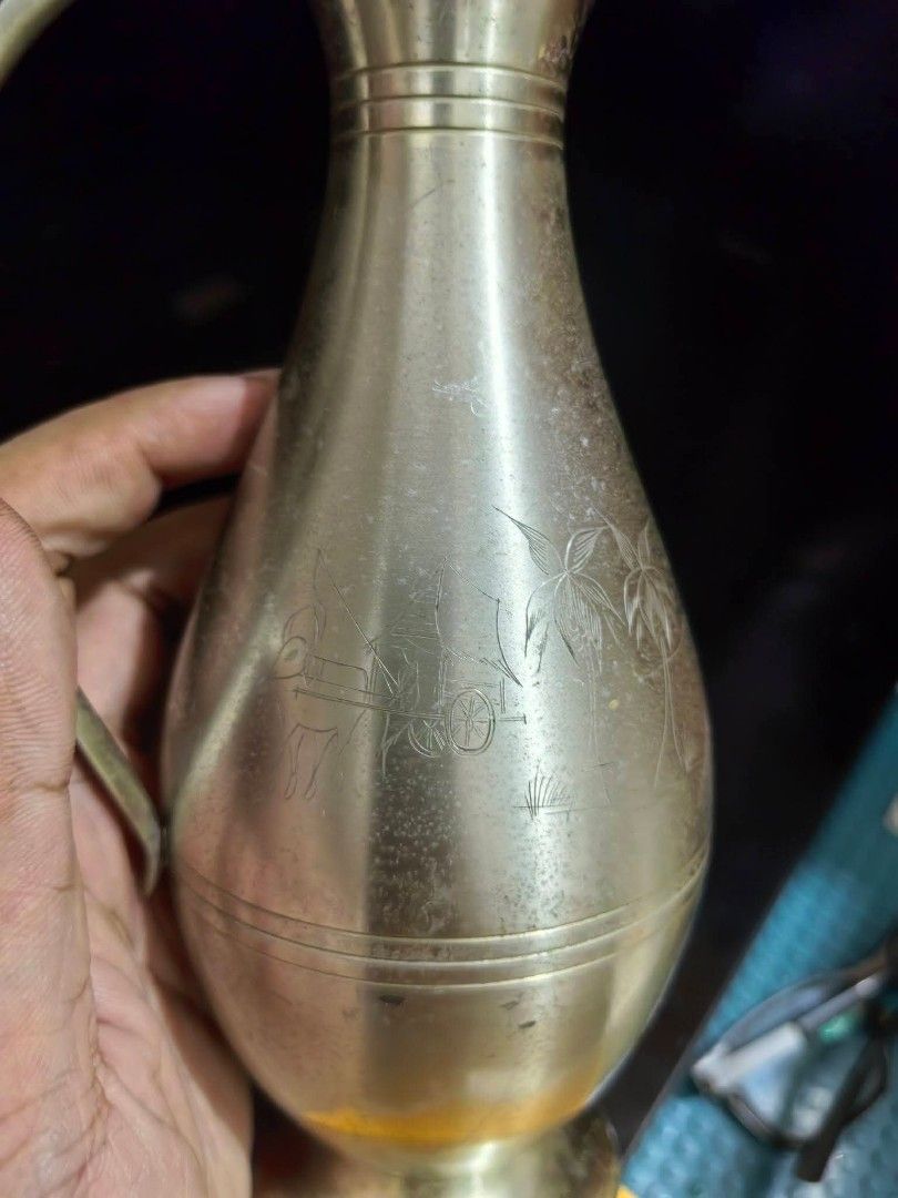 Pewter Pitcher or Vase (Category: Vases & Decorative Bowls) located in Cebu City. Submitted by dudes_villanueva (Listing ID 1461894453, Image 3). Description: Pewter Pitcher or Vase Markings : Pewter Penang Malaysia 📌 Featuring an engraved tropical scene with palm trees. 📌 Has few light scratches and tarnish on some parts. Height : 7.75 in.