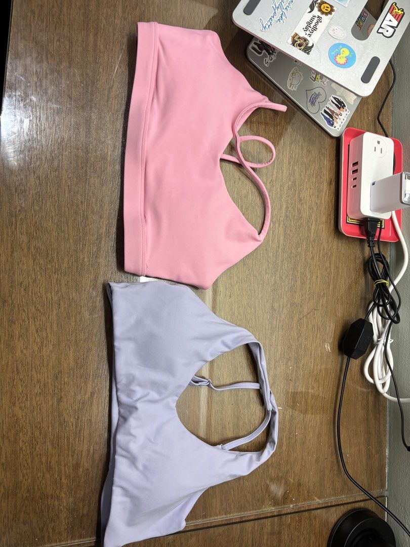 Pink & Lavender Sports Bra Set (Category: Activewear) located in Paranaque City. Submitted by corinne_see (Listing ID 1461940495, Image 1). Description: - Set of 2 sports bras - Colors: Bright Pink & Soft Lavender - Features a stylish strappy back design - Ideal for workouts or everyday wear - Offers comfort and support.