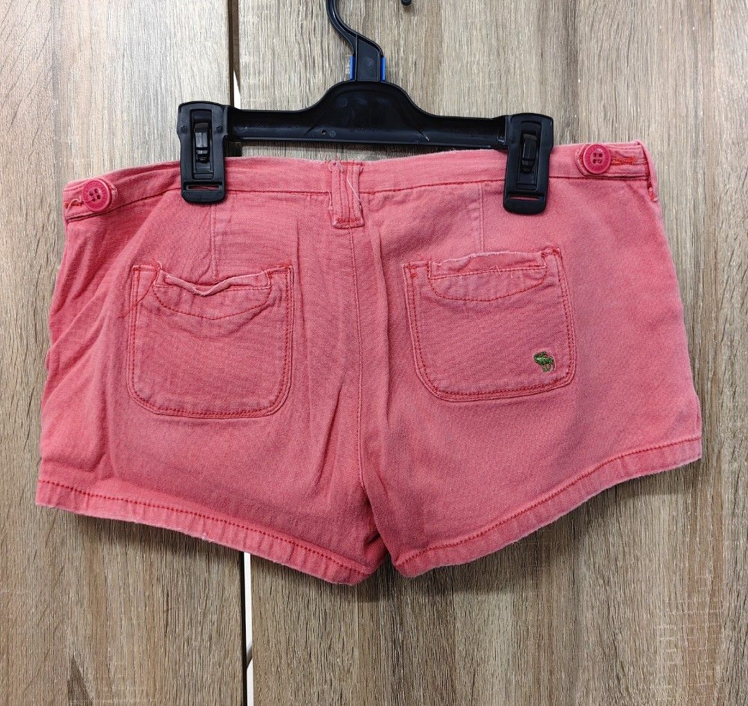 Pink Denim Shorts with Button Fly (Category: Shorts) located in Las Pinas. Submitted by offtonewhome (Listing ID 1461800832, Image 2). Description: - Cute pink denim shorts - Button fly closure - Two front pockets - Two back pockets - Small embroidered detail on right back pocket - Waist: Approx. 15 inches across - Inseam: Approx. 6 inches.