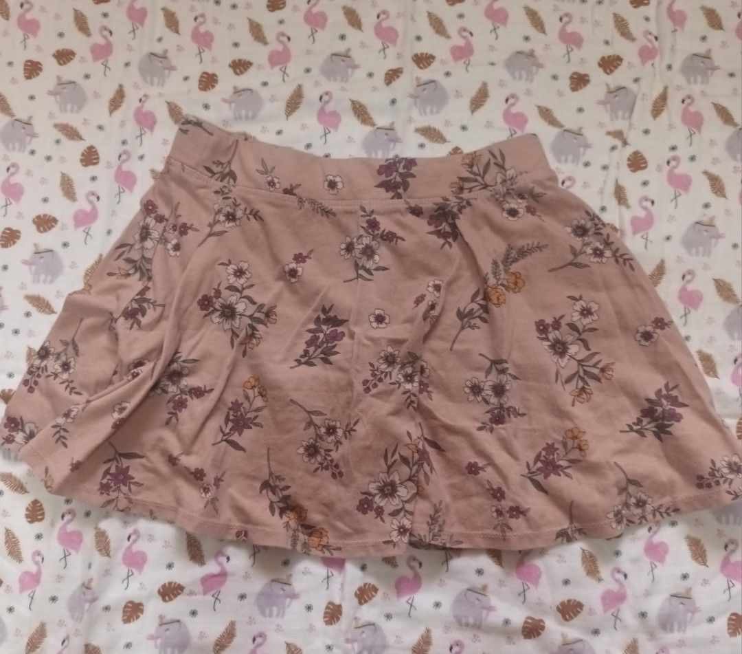 Pink Floral A-Line Skirt (Category: Skirts) located in Pasig City. Submitted by zeallion_149f0e (Listing ID 1461891095, Image 1). Description: - Adorable pink skirt with a charming floral print. - Flattering A-line silhouette that flares out gently. - Made from soft and comfortable fabric for all-day wear. - Versatile piece: great for casual outings or dressing up. - Effortlessly pairs with various tops for different styles..