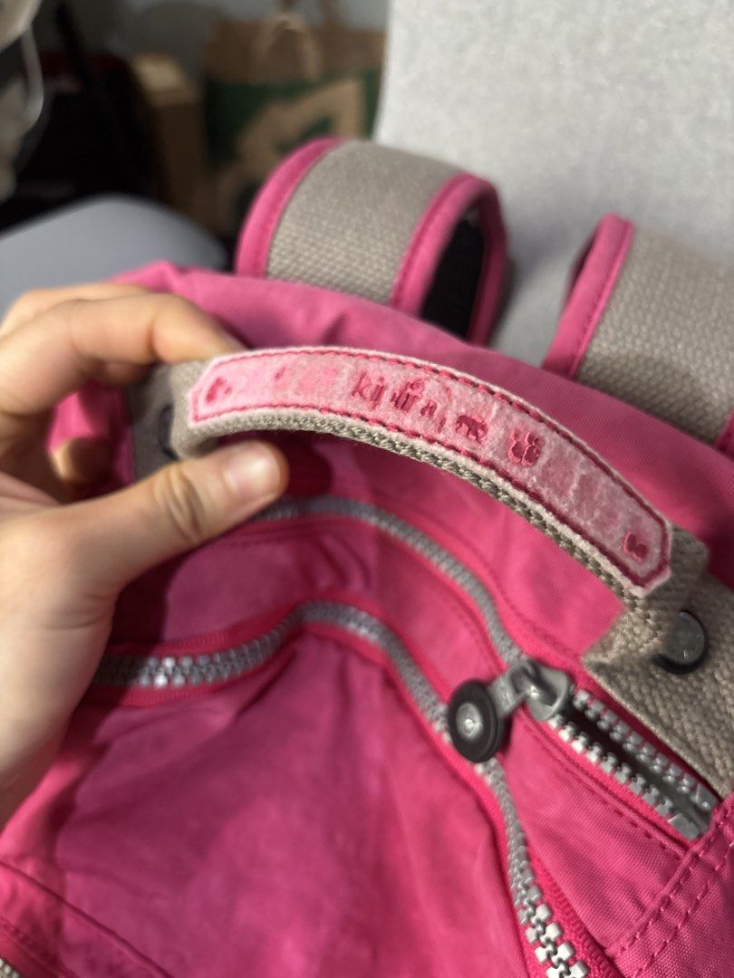 Pink Kipling Backpack (Category: Backpacks) located in Paranaque City. Submitted by corinne_see (Listing ID 1461943533, Image 2). Description: - Classic pink Kipling backpack - Made of durable nylon - Multiple pockets and zippers for organization - Adjustable shoulder straps for comfort - Ideal for school or everyday use.