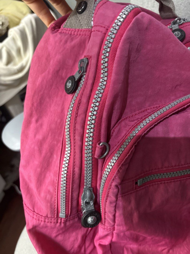 Pink Kipling Backpack (Category: Backpacks) located in Paranaque City. Submitted by corinne_see (Listing ID 1461943533, Image 3). Description: - Classic pink Kipling backpack - Made of durable nylon - Multiple pockets and zippers for organization - Adjustable shoulder straps for comfort - Ideal for school or everyday use.