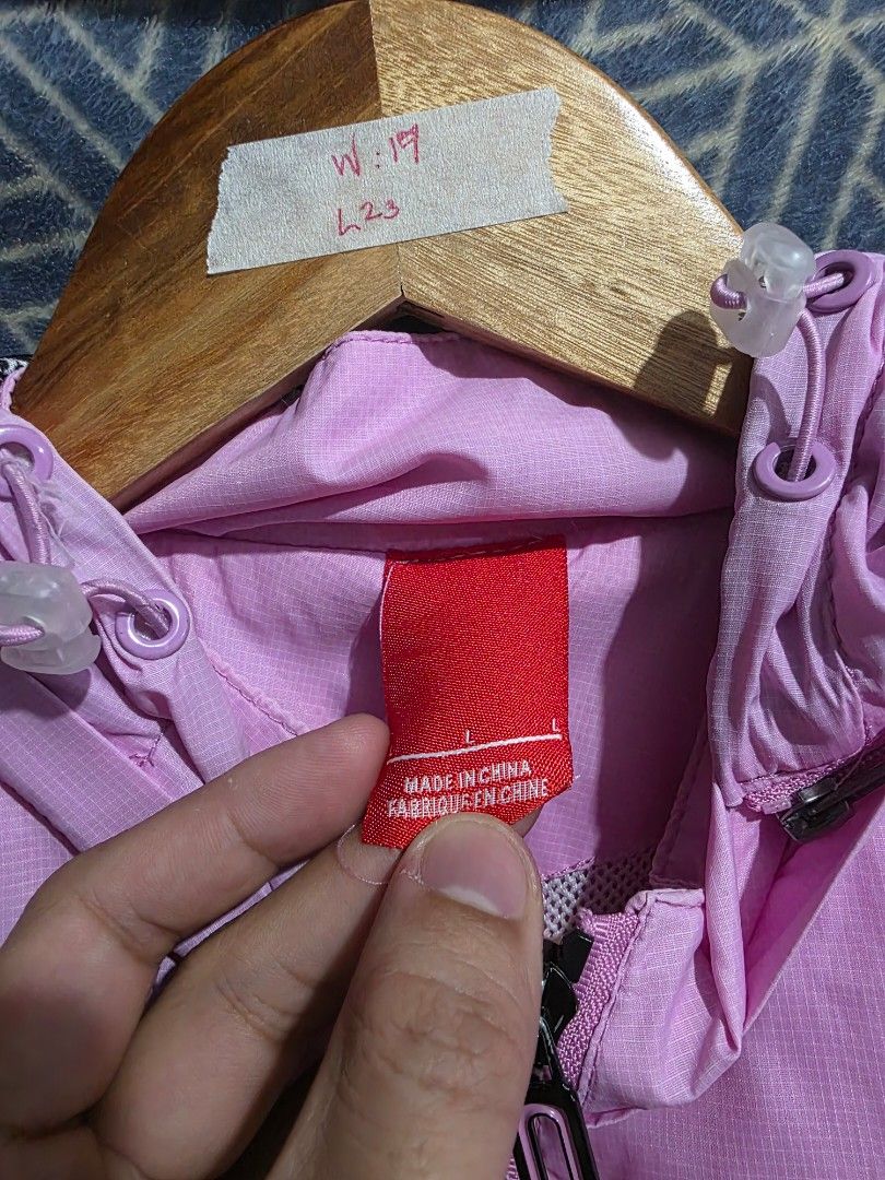 Pink Lightweight Jacket with Zipped Pockets (Category: Coats, Jackets and Outerwear) located in Quezon City. Submitted by kick_mnl (Listing ID 1461865554, Image 2). Description: - Light pink jacket - Size L - Full zip front - Two zipped side pockets - Elasticated cuffs and hem - Reflective dot details along the chest - Made in China.