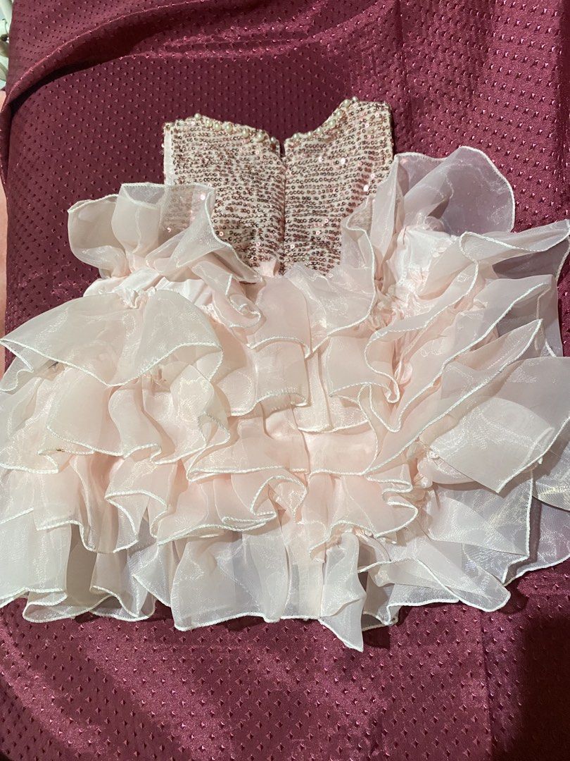 Pink Ruffled Dress with Sequined Bodice (Category: Babies & Kids Fashion) located in Manila. Submitted by boss_madam (Listing ID 1461996267, Image 1). Description: Cute pink party dress for girls! Sparkly sequins, ruffles, and a matching bow. Zipper back. .
