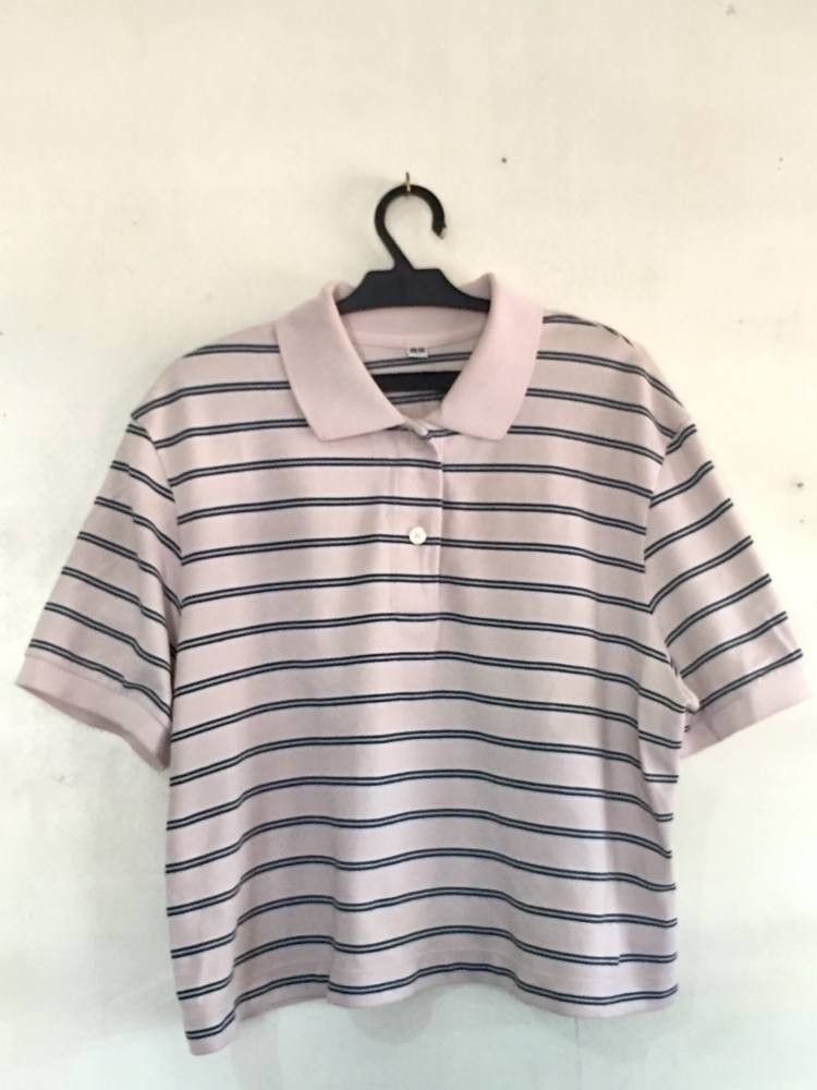 Pink Striped Polo Shirt with Collar (Category: Tshirts & Polo Shirts ) located in Manila. Submitted by infinitecollections.17 (Listing ID 1461837270, Image 2). Description: - Pink polo shirt with navy stripes - Classic collar and button-up front - Short sleeves - Comfortable fabric - Ideal for casual or sporty looks - Easily pairs with jeans or shorts 2 for 300.