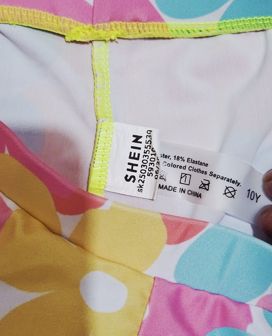 PL Shein rashguard, 10yo (Category: Babies & Kids Fashion) located in Pasig City. Submitted by amybelle15 (Listing ID 1461942299, Image 2). Description: Top and bottom set with padding Gently used Fits 9-10yo flaw: has few mildew.