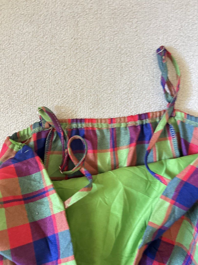 Plaid Graphic top (Category: Others Tops) located in Quezon City. Submitted by y2klar (Listing ID 1461989476, Image 3). Description: Plaid Graphic top Small-Medium L-25 Width-14 10/10 Condition no flaws..
