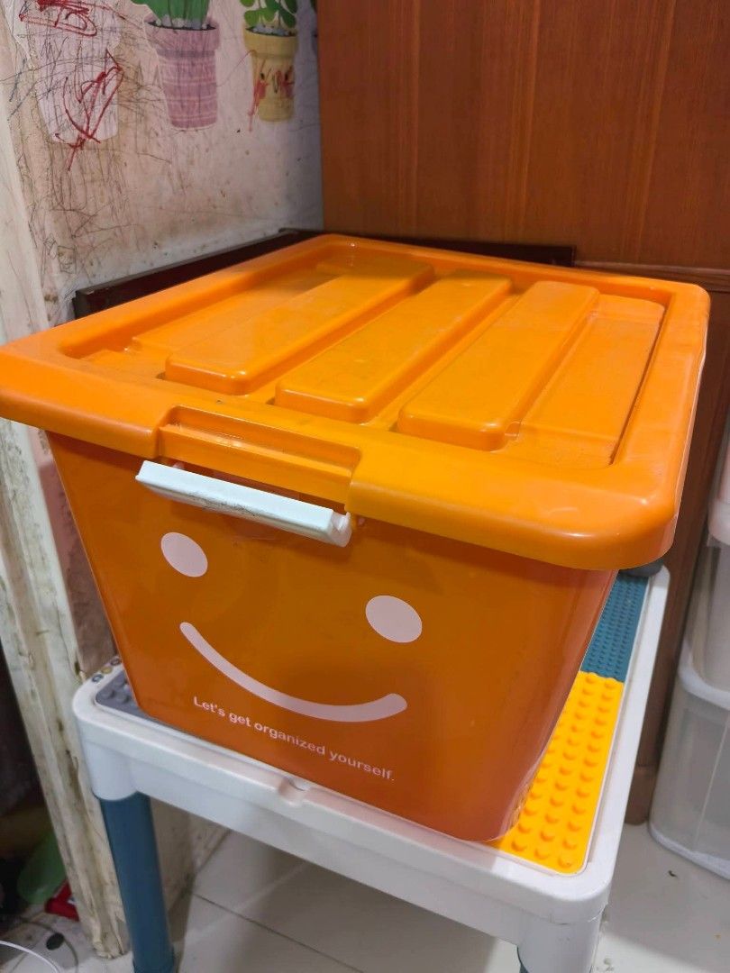 Plastic Storage Box - with Wheels. (Category: Storage Boxes & Baskets) located in Cebu City. Submitted by dudes_villanueva (Listing ID 1461817508, Image 1). Description: Plastic Storage Box - Orange Top Lid with Wheels. 📌 In excellent condition. L19.75xW15.5xH13 in.