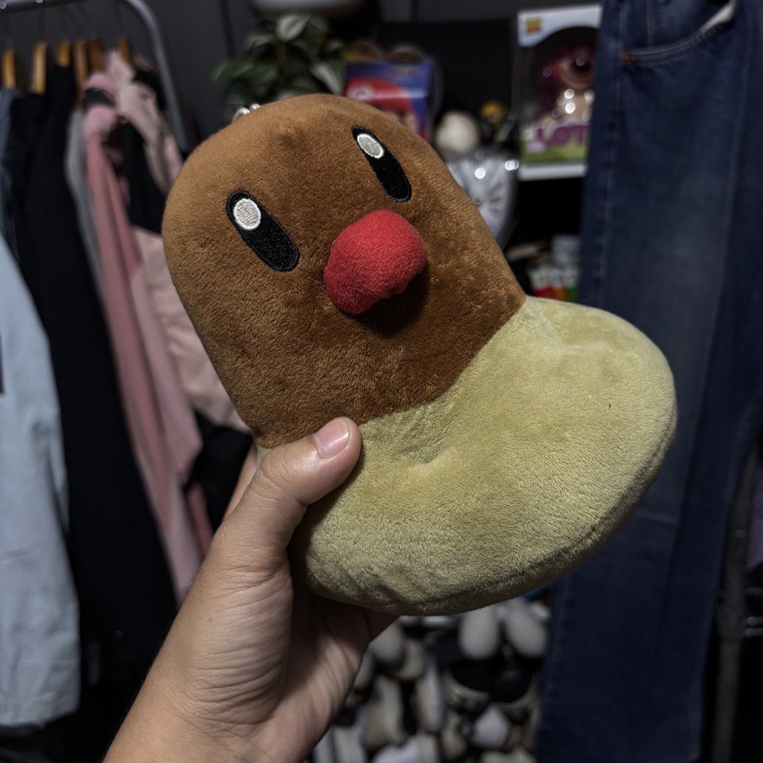 Pokemon Diglett Plush Toy (Category: Plushies & Soft Toys) located in Caloocan City. Submitted by bonsatocha43876 (Listing ID 1461971989, Image 3). Description: - Diglett plush toy - Price: P350 for the set - Ideal for Pokemon collectors and fans - Soft and cuddly material - Suitable for display or play.