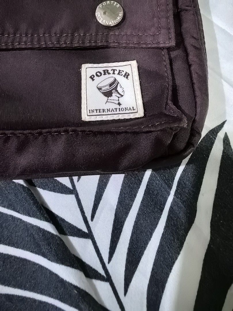Porter Sling Small Crossbody Bag (Category: Luxury Bags & Wallets) located in Batangas. Submitted by theitemspot (Listing ID 1461945889, Image 2). Description: Authentic Porter Small sling crossbody bag Og na OG, see details in pic. Small lng cya .pero napakadaming compartment. No major flaws..excellent Condi. Super nice soutin..minimalist.