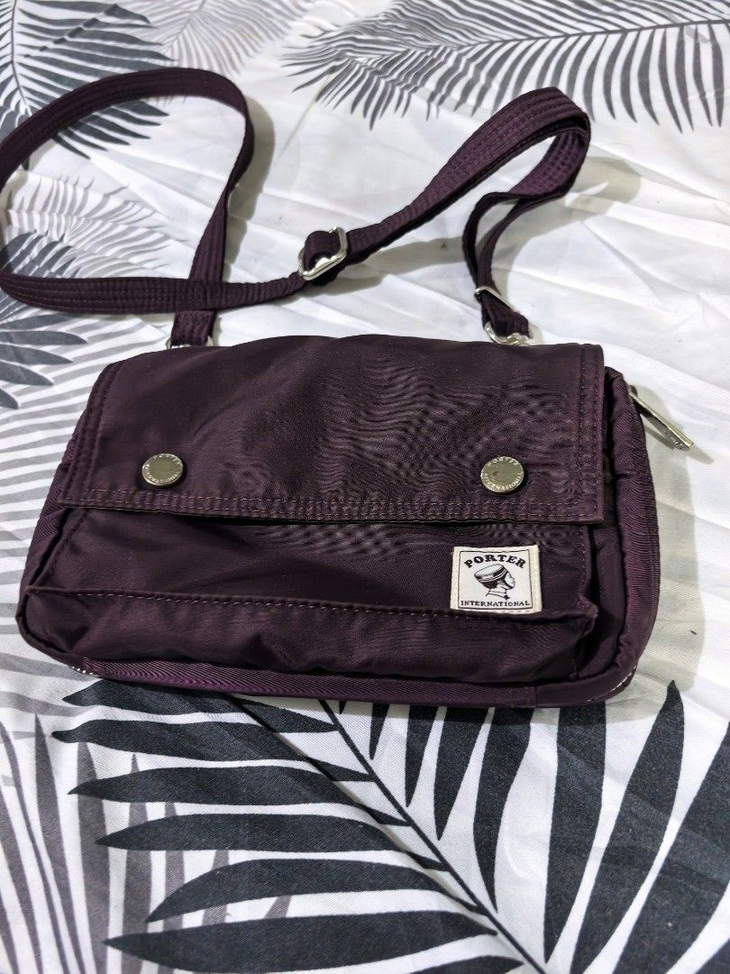 Porter Sling Small Crossbody Bag (Category: Luxury Bags & Wallets) located in Batangas. Submitted by theitemspot (Listing ID 1461945889, Image 1). Description: Authentic Porter Small sling crossbody bag Og na OG, see details in pic. Small lng cya .pero napakadaming compartment. No major flaws..excellent Condi. Super nice soutin..minimalist.