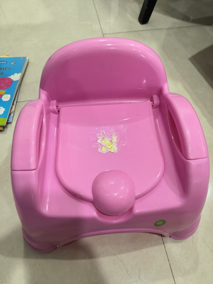 Potty Trainer 2in 1 pink (Category: Kids Tables & Chairs) located in Taguig. Submitted by ariasclosetph (Listing ID 1461865799, Image 1). Description: Never used. may sticker lang nadikit na hindi na matanggal.