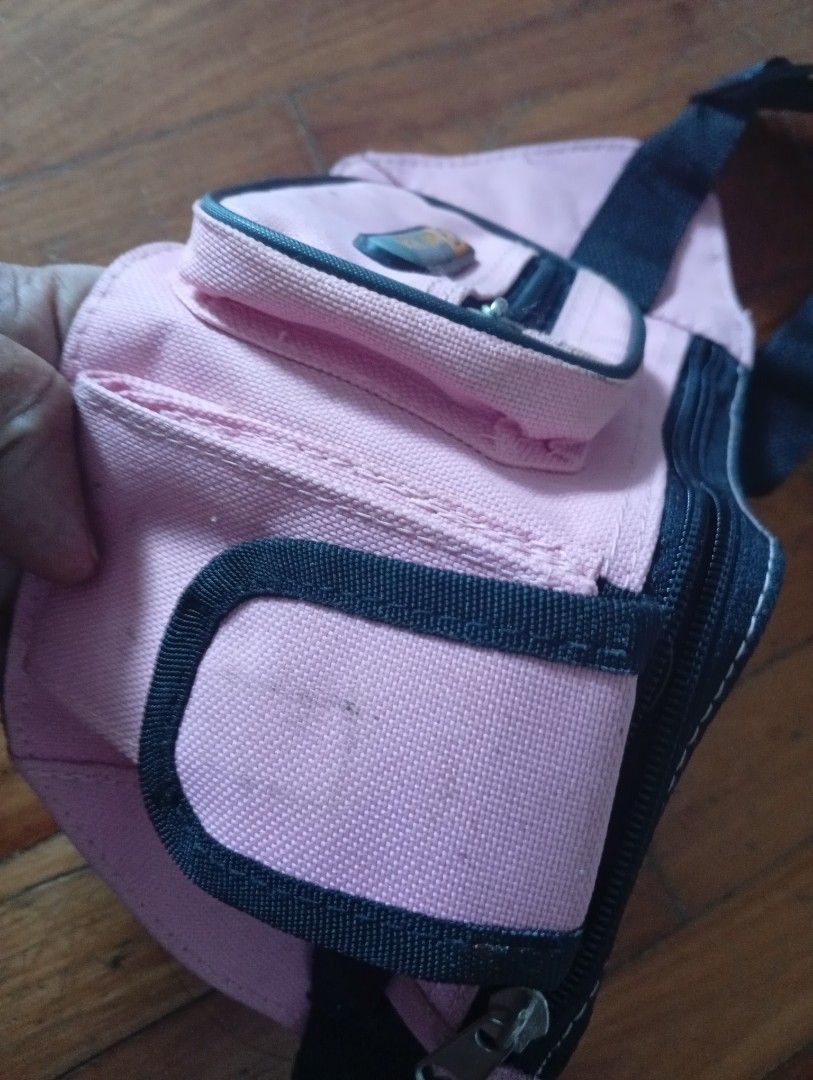 Pouch (Category: Purses & Pouches) located in Singapore. Submitted by crisis7979 (Listing ID 1461811413, Image 6). Description: - Pink pouch - Multiple zippered compartments - Front pocket - Adjustable strap.