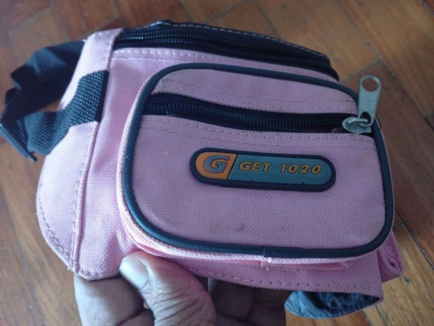 Pouch (Category: Purses & Pouches) located in Singapore. Submitted by crisis7979 (Listing ID 1461811413, Image 5). Description: - Pink pouch - Multiple zippered compartments - Front pocket - Adjustable strap.